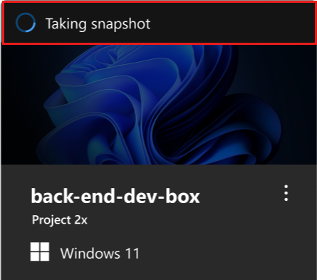 Screenshot of the developer portal, showing a dev box tile with the message Taking snapshot.