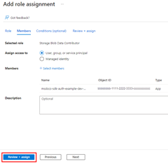 A screenshot showing the completed Add role assignment page and the ___location of the Review + assign button used to complete the process.