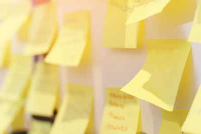 Screenshot of a whiteboard containing sticky notes. The contents of the sticky notes aren't legible.