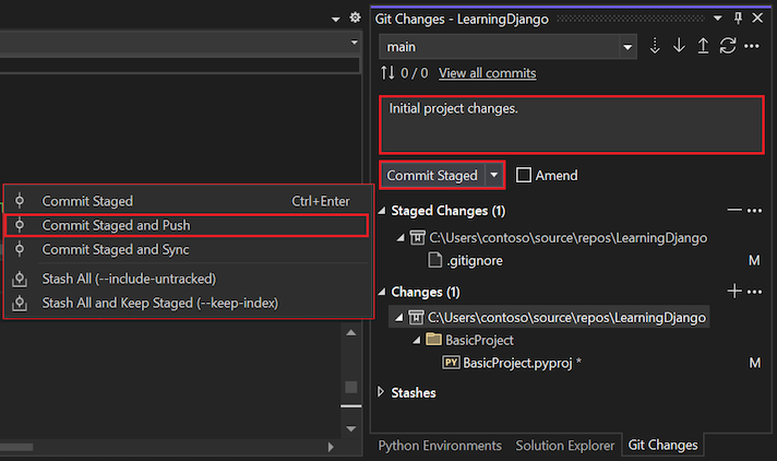 Screenshot that shows how to edit the commit message and commit and push the staged commits in the Git Changes window.