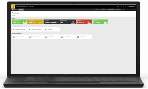 A fotografia mostra um laptop que exibe o portal da Web do Servidor de Relatórios do Power BI.
