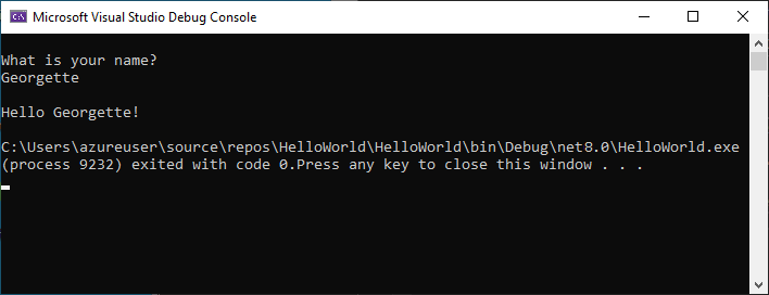 Captura de tela da janela Console de Depuração mostrando o prompt para um nome, a entrada e a saída de Olá, Georgette!.